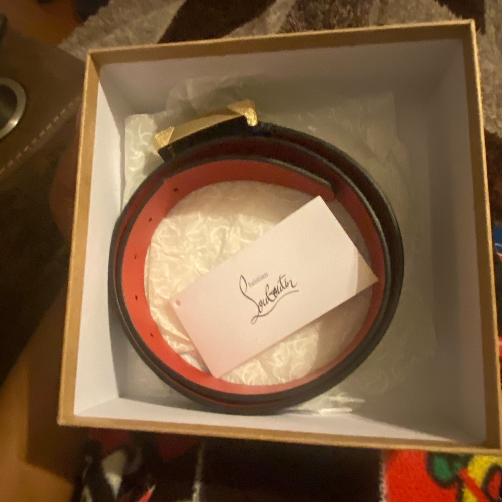 Christian Louboutin red bottoms and belt. Shoes size 42 belt 85. Only wore once